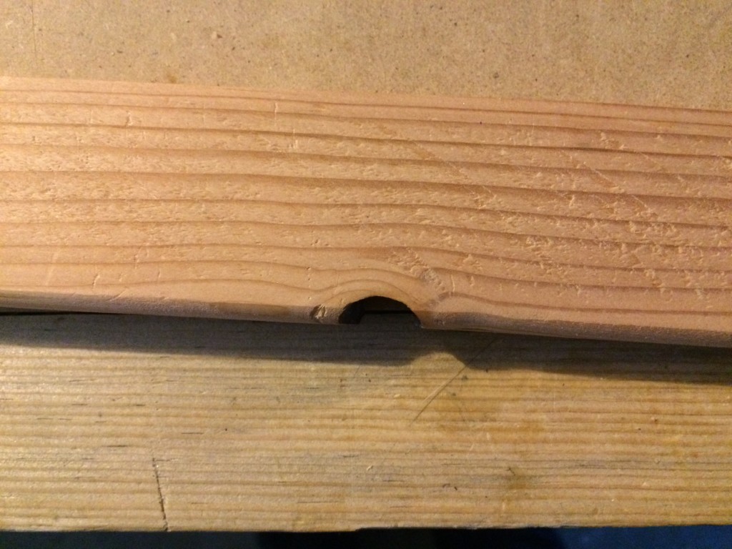 Note that it's not a perfect piece of wood.  It does need to be straight in order to fit the rail, but it does have imperfections.  All the knots are on the bottom of the raddle.  The top of the raddle should be smooth and flat so you have a consistent surface when nailing.